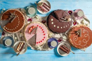 Delicious cakes serving with coffee. Sweet dessert with coffee.