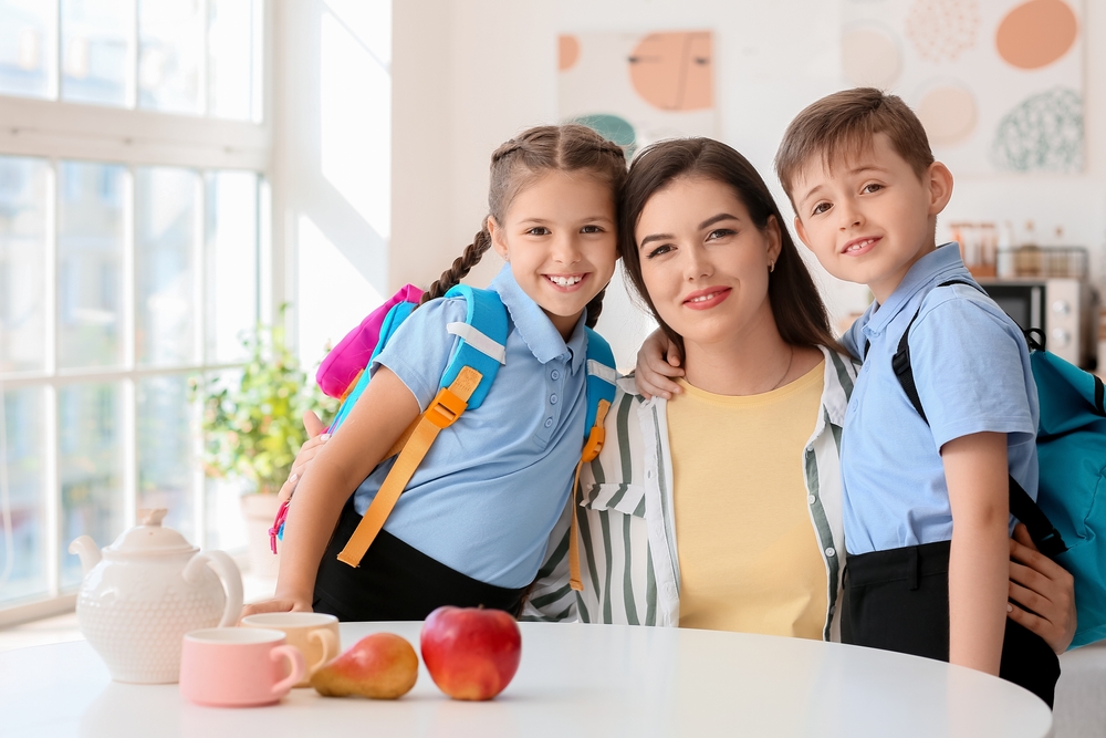 little,schoolchildren,with,their,mother,at,home